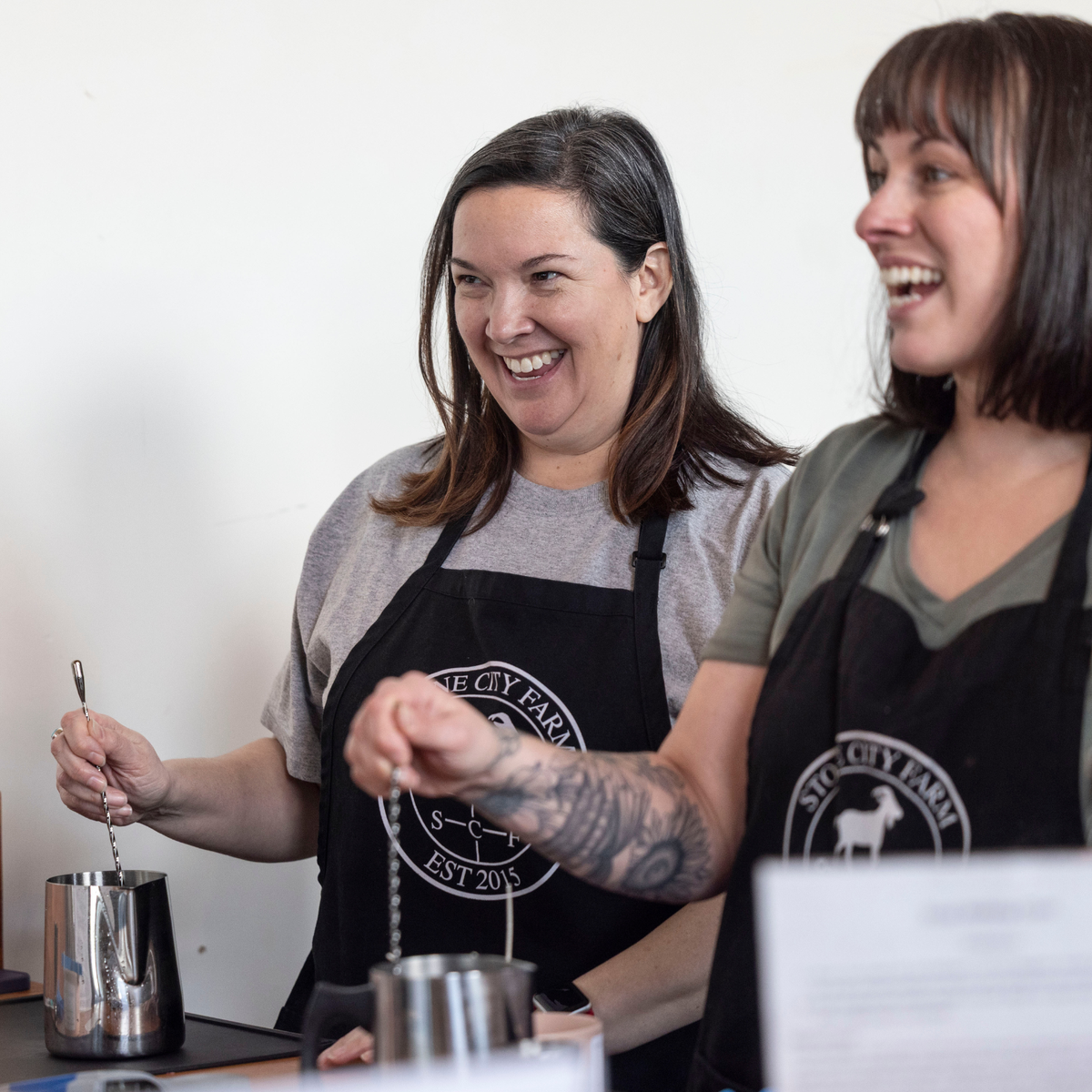 Guests laughing during a candle making class in-store in Tenino