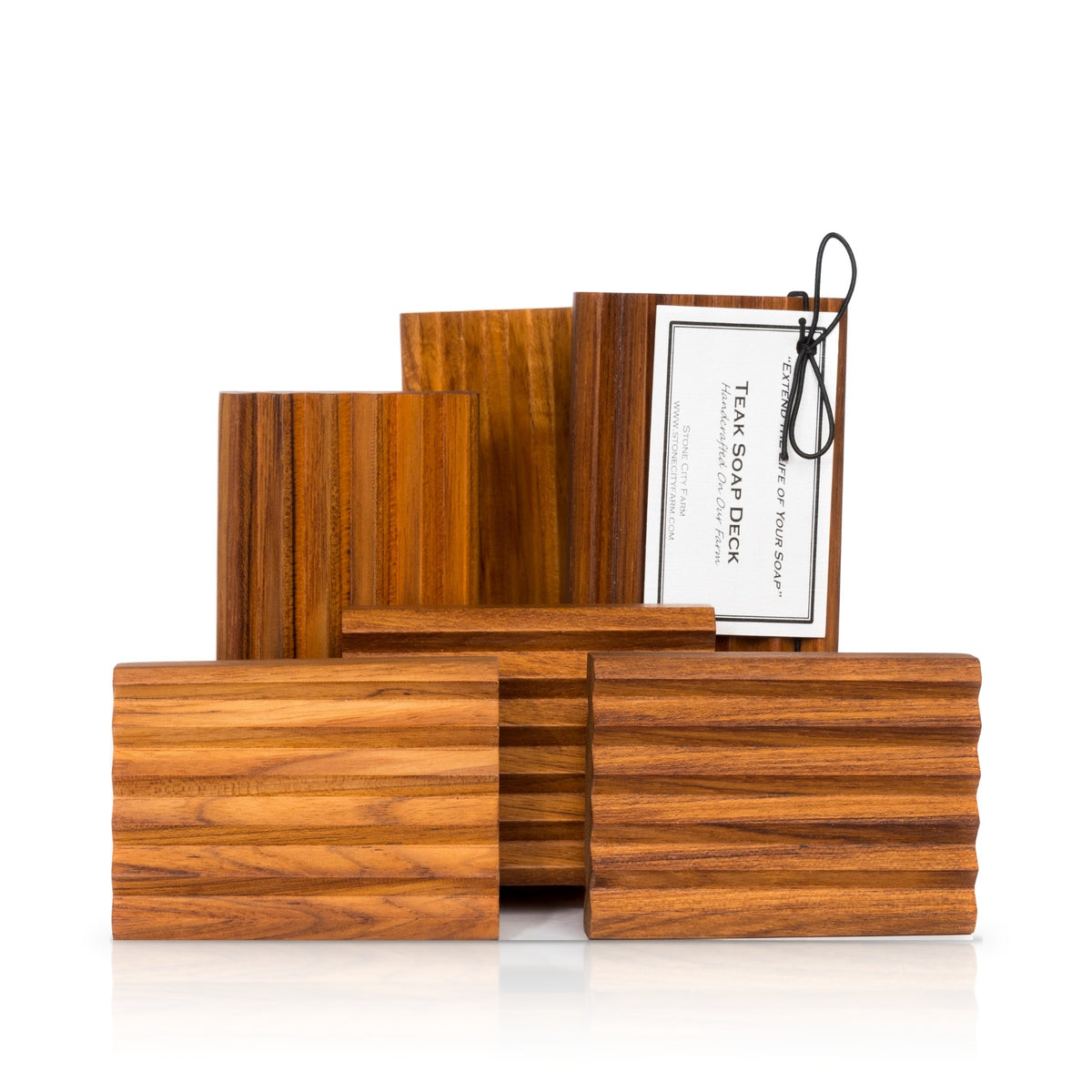 Straight Teak Soap Dish, handcrafted teak with straight grooves, shown stacked with a Stone City Farm tag